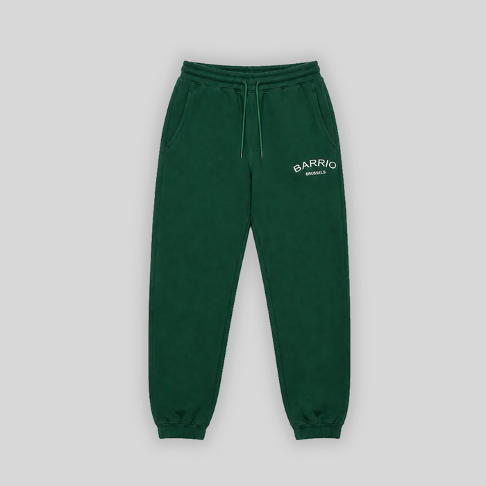 Barrio Clothing Brussels Forest green jogger pants embroidered white logo, tapered fit with elasticated cuffs, front view